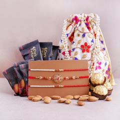 Three Designer Rakhis with Chocolates N Almonds - Rakhi Combos