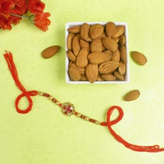 Appealing Pink Diamond Rakhi with Almond Nuts For UK